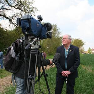 Janet Norman-Philips Eddie Coe On TV At Unveiling May 2010
